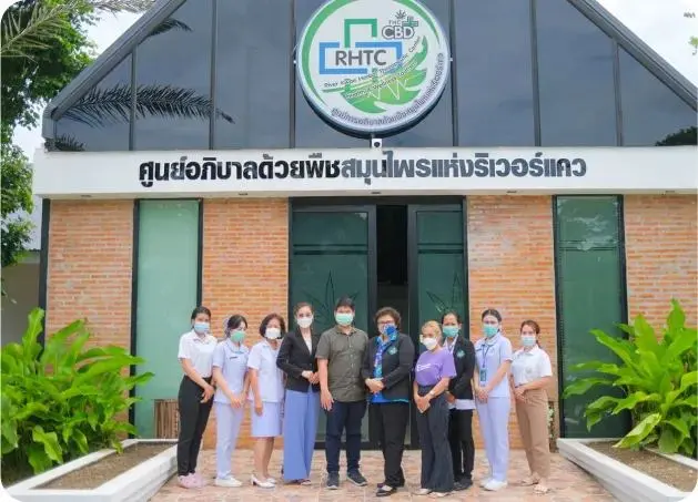 ATIZ team with a customer's staff in front of their clinic