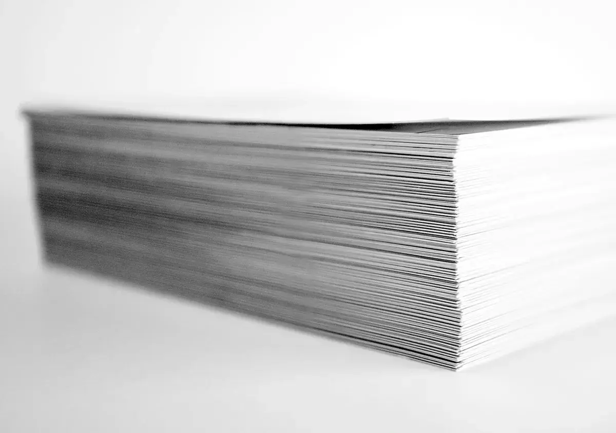 A thick stack of photocopied paper