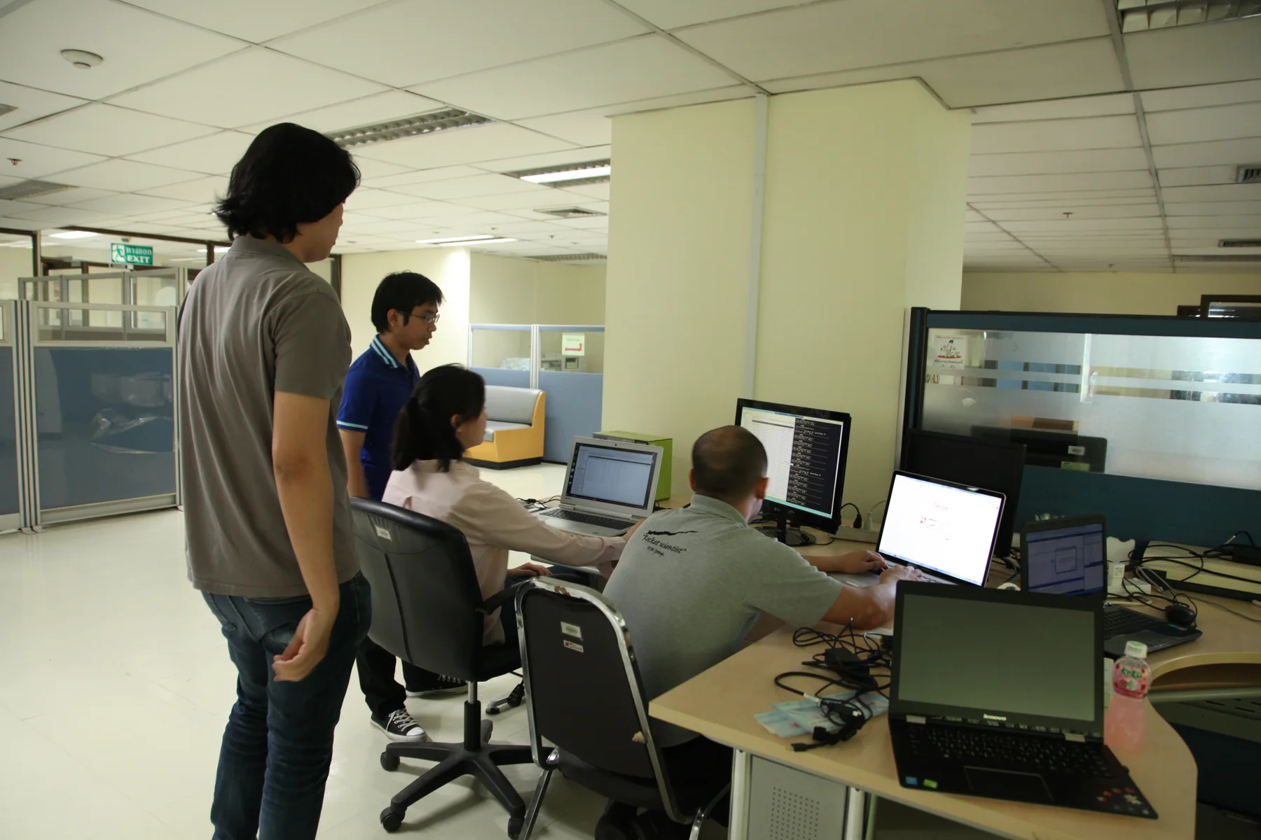 Hospital and Atiz teams working with the deployed BabyTag system